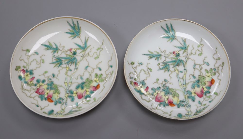 A pair of Chinese famille rose fruit and bamboo saucer dishes, diameter 13cm